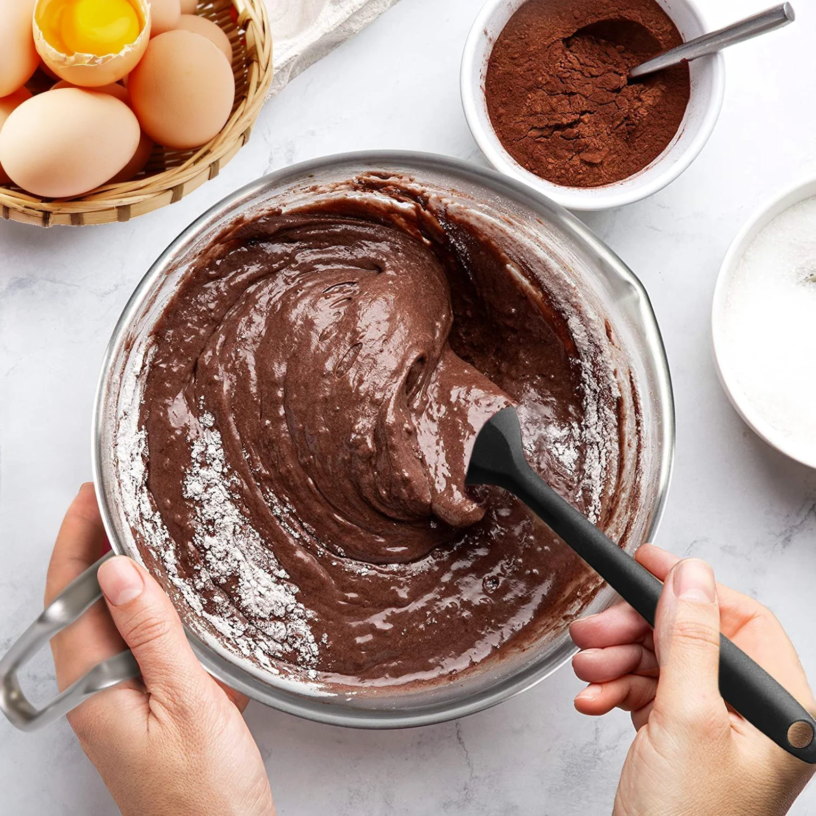 Chocolate being stirred in a stainless melting insert